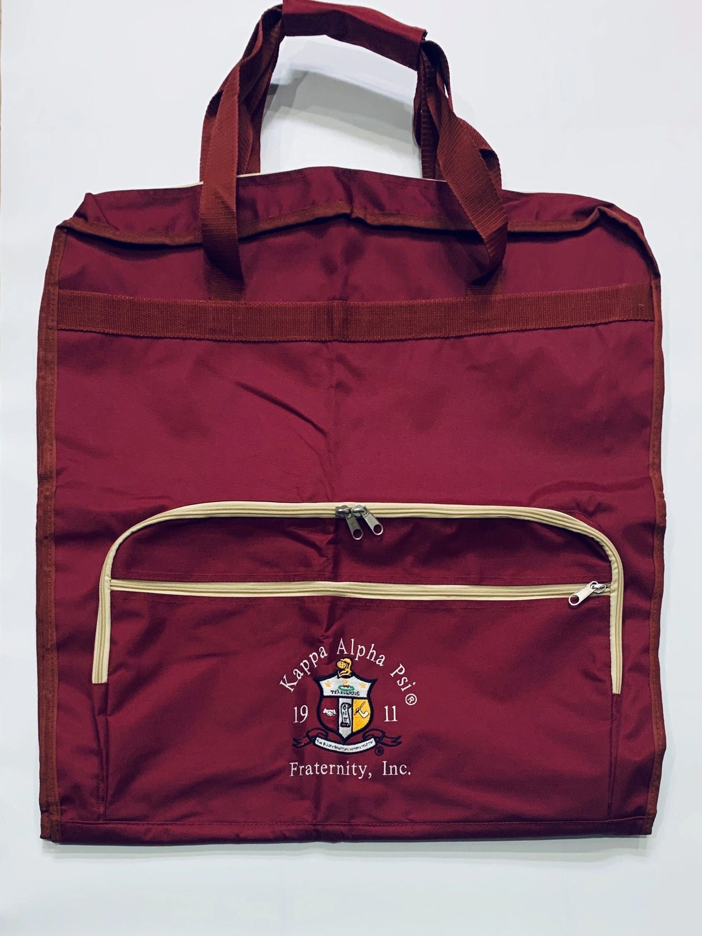Crimson garment bag with cream trim